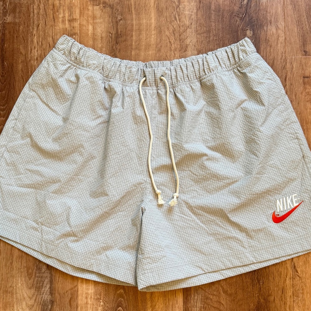 Nike Men’s Athletic Shorts in Light Gray with Red Logo
